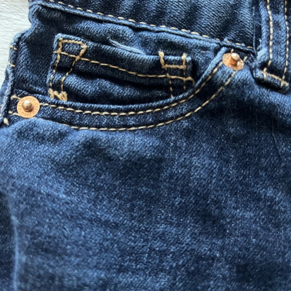 Cat & Jack kids blue jeans size 4T. Gold stitching around pockets.